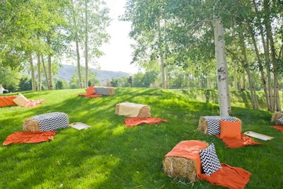 At a Belvedere-sponsored event during the 2012 Food & Wine Classic in Aspen, guests sat on haystacks covered with bright orange blankets and chevron-patterned pillows.