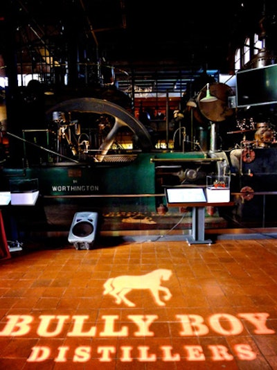 The brand's name and its horse logo appeared on the floor of the museum beside a turn-of-the-century water wheel.