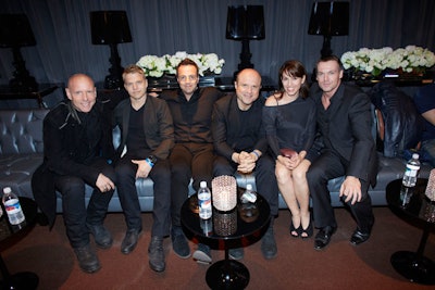 Talent relaxed in an on-site green room, which was lined with sleek silver lounge furniture and glossy black lamps and cocktail rounds.