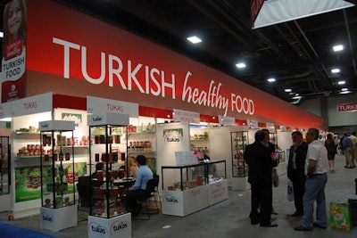 Several countries set up mini pavilions with products from their homelands. Turkey designed its exhibition area like a grocery-store aisle with food on the shelves and signage for the different categories of food and drink.