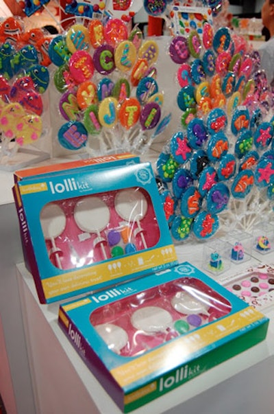 Dynamic Confections' Candy Land-style booth had three large displays of sweets including its do-it-yourself Lolli Kit and examples of the finished products.