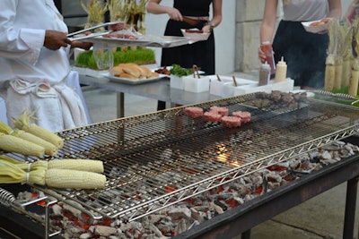 The barbecue station offered grilled corn, mini beef or mushroom burgers, and hot dogs.