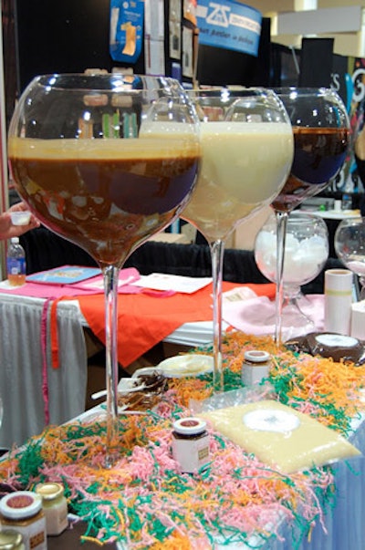 Somebody's Mother's Chocolate Sauce provided samples of the company's caramel, white chocolate, and plain chocolate sauces from oversize wine glasses.