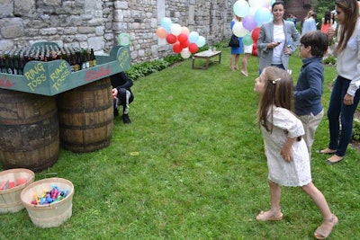 Carnival games, such as the ring toss, were mostly positioned against one far wall in a straight line. All games featured some sort of special Stella McCartney branding, but done in a playful and casual manner.