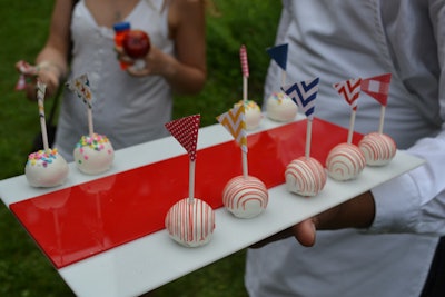 Among the desserts served were 'big top pop rock' cake balls, orbs of vanilla buttermilk, or red velvet cake topped with red-and-white stripes or confetti sprinkles.