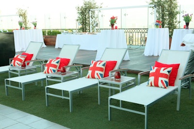 To celebrate 20 years of nonstop service between LAX and Heathrow, Virgin Atlantic Airlines hosted a party intended to promote quality, style, and, the U.K. in 2010. At the event, held atop the London West Hollywood, British flag-emblazoned throw pillows were displayed on lounge chairs from Classic Party Rentals.