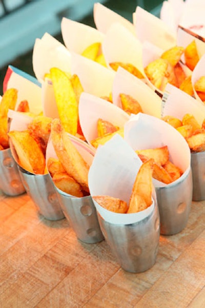 The London West Hollywood created British snacks, including fish and chips wrapped in paper torn from Biritish gossip magazines, for Virgin Atlantic's rooftop party.
