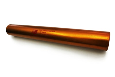 The invitation for the New Balance experience store preview in New York in 2011 was a brass-colored relay baton, which hinted at the running-themed event concept.