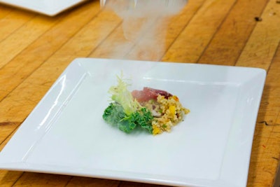 From Encore Catering comes their crispy matchstick salad with tuna and balsamic glaze, infused with applewood smoke.
