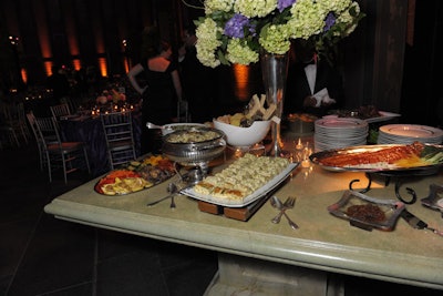 Design Cuisine Caterers, the longtime caterer for the event, created a seated buffet dinner and desserts. The menu included Tuscan grilled beef with roasted cipollini onions and balsamic demiglace sauce, hickory barbecued salmon, an asparagus Parmesan tart, and spring pea risotto.