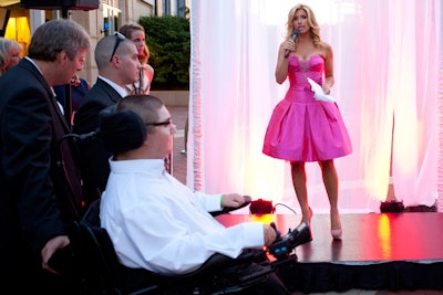 Wearing a summery pink dress that local designer Daniel Faucher designed for her, Bianca de la Garza of WCVB TV acted as host and M.C.