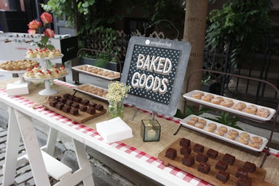 A baked-goods station had sweet bites, including mini brownie squares, sugary doughnut holes, and bite-size chocolate chip cookies.