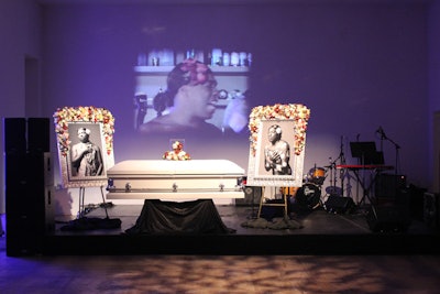 Kalup Linzy, one of two artists performing for the night, presented his piece titled 'A Memorial for Taiwan.' Prior to the start of the event, and perhaps to build buzz among attendees, the stage was set up with a casket and floral arrangements for a funeral-like setting. A video projected on the wall displayed the artist acting out the character, Taiwan.
