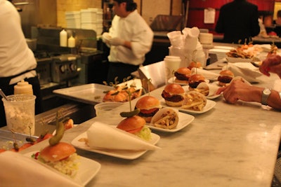 The Todd English Food Hall was also open for the night and had eight stations serving dishes. This included pulled pork sliders from the grill (pictured), fig and prosciutto pizzas, assorted sushi rolls, whole salt-crusted monkfish, goat cheese ravioli, King crab cocktails, chicken dumplings, and mini curly cakes.