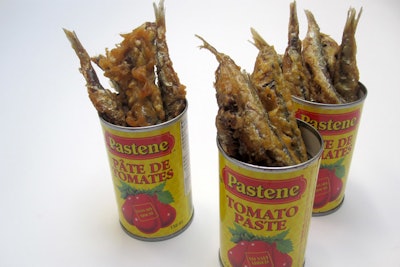 For cocktail receptions, Lindsey Shaw Catering has introduced fried anchovies with sage, rock salt, and truffle aioli served in mini tomato-paste cans.