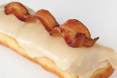 Glazed & Infused, a new doughnut shop with locations throughout the city, caters handmade treats for breakfast meetings. Available by the dozen, the doughnuts come in flavors such as maple-bacon long john (pictured), PB&J, and roasted banana.
