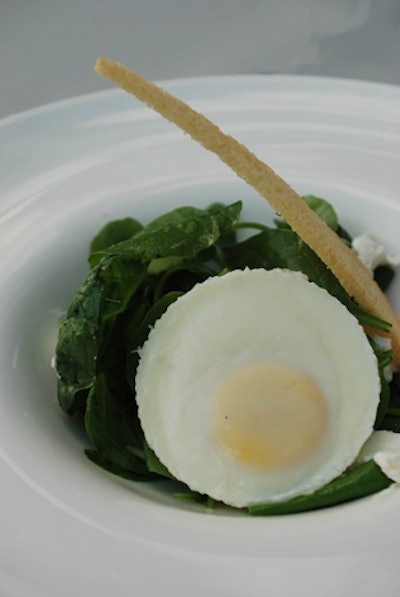 At Marwen's Paintbrush ball in June, Limelight Catering served a first course of watercress and shaved asparagus salad with aged goat cheese, mustard vinaigrette, soft poached egg, and a brioche shard.