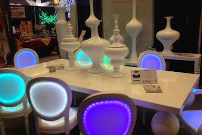 Luxe Event Rentals is offering its new, LED color-changing chairs as part of its 'Le Lumiere' collection. The customizable chair structure is available in white, silver, or black with LED insert panels. The brand-new pieces, exclusive to Luxe, come with a rental fee of $45-$85 for the armless version, or $195-$265 for the chairs with arms.