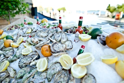 Nothing says summer like fresh seafood. At the Power Ball in Toronto, V.I.P. guests helped themselves to shrimp and freshly shucked oysters at a chilled seafood bar provided by Petite Thuet.