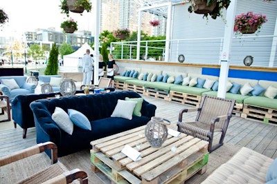 For the first time, the V.I.P. area of Power Ball was outside, situated near the Natrel pond. Sponsored by Soho House and Grey Goose, the space was inspired by an English picnic and styled with rustic elements. Loading pallets acted as banquette seating and cocktail tables.