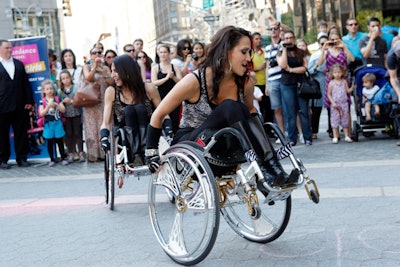 On Thursday, May 31, two of the four stars from the Sundance Channel's new series Push Girls performed at three different locations in New York. The pop-up promotions were accompanied by a DJ booth and signage as well as branding displays in the wheelchairs of the performers.