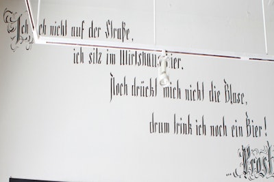 German drinking proverb, hand-painted on Wirtshaus’s main dining room wall.