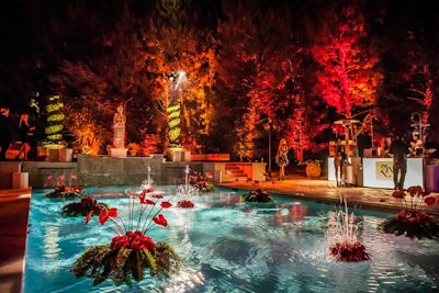 A floating fountain and floral arrangements filled the pool.
