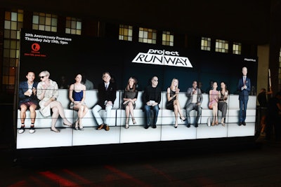 The 20-foot-long video installation was designed to give attendees a taste of what it's like to walk a runway. It was operated by a camera hidden within the structure, and the digital, on-screen images moved and responded to passersby.