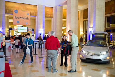 Chevy displayed its Volt at the entrance to the Merchandise Mart, right in front of the TechWeek check-in desk. Across from the auto display, Diet Coke had a lounge with red and silver decor, product samples, and brand reps dressed in red.