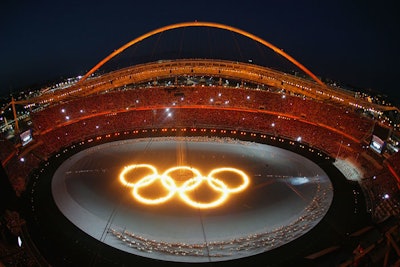 The five Olympic rings were ablaze in the center of the stadium at the beginning of the 2004 Olympic opening ceremony in Athens.