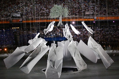 A scene from Greek mythology, where an olive tree sprang from a rock after Athena struck it with her javelin, was depicted before the participating athletes entered the stadium.