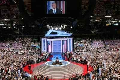The stage for President George Bush's speech at the convention put him on the floor—not too far above the party faithful—with the presidential seal below him, a not-so-subtle reminder of his status as the incumbent.