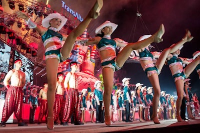 Cowgirls took to the stage at TransAlta Grandstand Show at the Calgary Stampede. Themed 'Century' in honour of the Stampede's 100th year, the show concluded with fireworks exploding from a three-storey-tall birthday cake each evening.