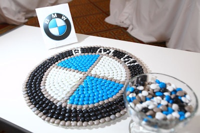 BMW returned as the automotive sponsor this year with an all-white lounge area for guests—with a touch of color from this edible logo.