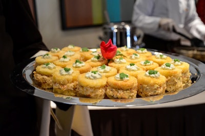 One of the Peabody Orlando's newest hors d'oeuvres is a chicken salad canapé with crushed smoked almonds and tarragon mousse.