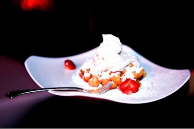 Mini funnel cakes with strawberries and shipped cream