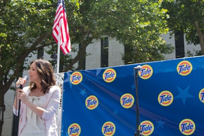 'Is it hot enough for everybody? It wouldn't be fourth of July week if it wasn't hot,' joked Katharine McPhee, star of Smash, about the day's soaring temperatures before jumping into a rendition of 'The Star Spangled Banner.'