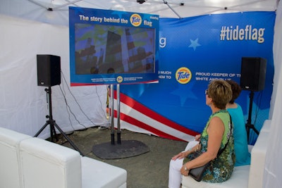 A tented area allowed visitors to watch a documentary about how Colonial Flag constructed the flag, swatch by swatch.