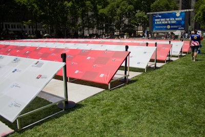 Made and constructed by Colonial Flag in Salt Lake City, Utah, Tide's flag contains more than 1,500 personal anecdotes and covered the green grounds of Midtown's Bryant Park for the July 3 event.