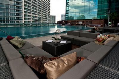 The pool deck transformed into a lounge for a party.