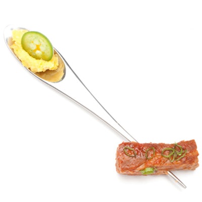 Pinch Food Design offers a different spin on babyback ribs, serving the barbecue classic on a spoon-shaped skewer with creamed corn and jalapeños.