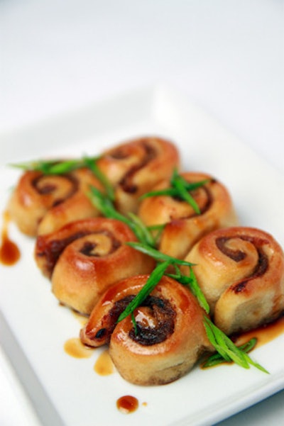 PS 7's Chef Peter Smith's pull-apart pork sticky buns are a mix of slow-cooked pork confit and brown sugar spice glaze rolled up in sweet dough.