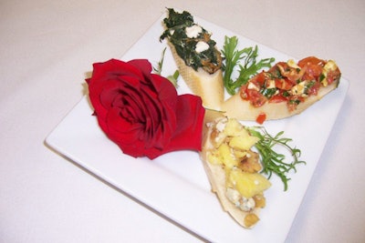 Tastings Caterers in Framingham serves up a trio of summer crostinis as a start to a formal dinner or as an appetizer at a cocktail party. Topping combinations include fresh tomato, basil, and smoked mozzarella; pineapple, creamy gorgonzola, and toasted honey walnuts; and wilted baby spinach with melted feta, caramelized onions, and five varieties of toasted nuts. For a gluten-free option, the toppings can be used to fill mushroom caps.
