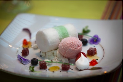 At this year's Corcoran Ball, Occasions served a toppled timbale of lemon and sweet basil ices presented on crushed meringue with wild strawberry sorbet, fruit jellies, pulled sugar wands and meringue kisses. The dish is one of Occasions' 'New Nordic' desserts.