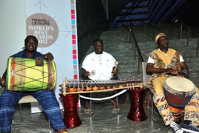 A traditional African drum performance marked the entrance to the World's Best Awards at the Conrad New York on Thursday night. Guests could pose for photos with Masais, Kenyan natives in authentic costumes.