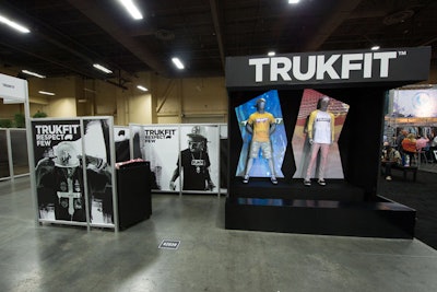 On the show floor of the Magic expo, two blank mannequins were mapped with 3-D projections of items from Lil Wayne's Trukfit clothing line.