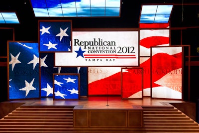 Romney's strategists envisioned 'America's living room' as the design for the convention stage inside the Tampa Bay Times Forum. 'We used the same wood tones to frame the screens, but they are layered so they are a mosaic of shapes. Above the whole thing are these skylights made out of screens as well. So in a sense it has a domestic architecture to it. It has a ceiling and walls and the things that are more typical of a living room architecture,' said Fenhagen.