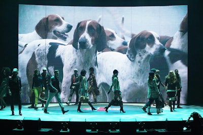 The fashion show's design included a new method for video playback with a semicircular LED wall. At times, the video wall showcased the models onstage so that guests could get a closer peek at what they were wearing. At other times—such as during the Tommy Hilfiger segment, which had a hunting theme—scenes that underscored the collection's aesthetic appeared as a backdrop.