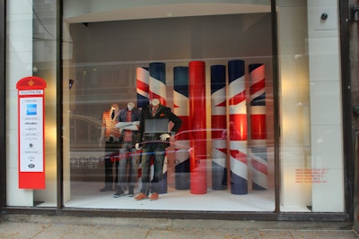 The windows of Macy's State Street had displays with the event's English theme, and a list of sponsors appeared on a window decal shaped like a classic English telephone booth.