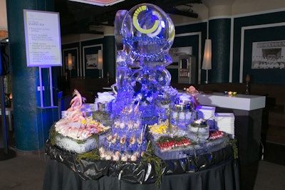Chicago Ice Works provided a towering ice sculpture with the Canteen logo. Dubbed the 'Ultimate Shellfish Bar,' the frosty food station held poached jumbo shrimp, shucked East and West Coast oysters, and San Francisco-style Dungeness crab and lobster cocktails with green onions and Louis dressing. There was more seafood to be had in the next room, where a sushi station from Kamehachi offered spider rolls, spicy tuna rolls, and more.